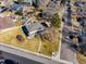 Aerial view of the home featuring a well-maintained yard and a convenient location within a neighborhood at 6111 W Fremont Dr, Littleton, CO 80128