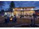 Outdoor entertaining space with a pergola, patio, fire pit, and seating area at 6111 W Fremont Dr, Littleton, CO 80128
