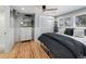 Bedroom featuring hardwood floors, and decor at 6111 W Fremont Dr, Littleton, CO 80128