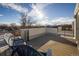 Spacious rooftop deck with city views and modern chairs at 3932 Quivas St, Denver, CO 80211