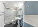 This bathroom offers a glass enclosed shower, pedestal sink, and ample storage at 9185 Jill Dr, Conifer, CO 80433