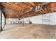 A large garage with a work area is a handyman's dream at 9185 Jill Dr, Conifer, CO 80433