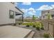 Landscaped backyard featuring a concrete patio, gravel accents, and a well-maintained lawn at 1846 Chestnut Ave, Erie, CO 80516
