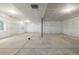 Unfinished basement space featuring concrete floors and white walls offers great potential at 1846 Chestnut Ave, Erie, CO 80516