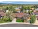 Aerial view of the property with mature trees, manicured lawn, and beautiful neighborhood at 3265 W 11Th Avenue Ct, Broomfield, CO 80020