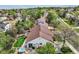 Aerial view of backyard with outdoor living space, including a jacuzzi, patio and well-maintained lawn at 3265 W 11Th Avenue Ct, Broomfield, CO 80020