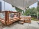 Backyard deck with outdoor seating and hot tub area, perfect for relaxation and entertaining at 3265 W 11Th Avenue Ct, Broomfield, CO 80020
