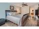 Bedroom with wood floors and connected sitting area at 3265 W 11Th Avenue Ct, Broomfield, CO 80020