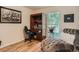 Office with built-in secretary desk, chair, and plush chaise lounge at 3265 W 11Th Avenue Ct, Broomfield, CO 80020