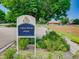 Zang Spur Park sign amidst lush greenery, inviting visitors to enjoy the outdoor space at 3265 W 11Th Avenue Ct, Broomfield, CO 80020