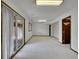 Spacious basement featuring a sliding glass door for natural light and easy access to the outdoors at 12658 W 1St Pl # 78, Denver, CO 80228
