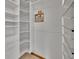 Organized walk-in closet with custom shelving at 12658 W 1St Pl # 78, Denver, CO 80228