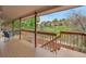 Deck overlooking tranquil waterway with a scenic view of surrounding homes and lush greenery at 12658 W 1St Pl # 78, Denver, CO 80228