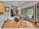 Dining area with light wood floors and a view of the deck at 12658 W 1St Pl # 78, Denver, CO 80228