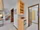 Hallway features a built-in wine rack and mini fridge at 12658 W 1St Pl # 78, Denver, CO 80228