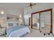 Spacious main bedroom with ample natural light and a large closet at 12658 W 1St Pl # 78, Denver, CO 80228