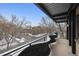 An outdoor covered balcony with curved metal railings offers great city views in this lovely home at 500 E 11Th Ave # 401, Denver, CO 80203