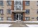 Exterior of the building with a brick facade and prominent signage above the entrance at 500 E 11Th Ave # 401, Denver, CO 80203