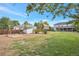 Expansive backyard with a swing set and shed offers plenty of space for outdoor activities and enjoyment at 801 S 15Th Ave, Brighton, CO 80601