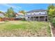 Spacious backyard with a covered patio and inviting fire pit offers plenty of room to roam at 801 S 15Th Ave, Brighton, CO 80601