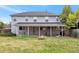 Lovely backyard boasts a patio with outdoor seating and a cozy fire pit for entertaining at 801 S 15Th Ave, Brighton, CO 80601