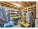 Unfinished basement area with lots of storage and organization shelves at 801 S 15Th Ave, Brighton, CO 80601