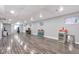 Finished basement with sleek flooring, recessed lighting, and plenty of space at 801 S 15Th Ave, Brighton, CO 80601
