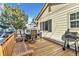 Wooden deck with seating area and grill at 4201 Beautiful Cir, Castle Rock, CO 80109