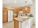 Kitchen with light wood cabinets, granite counters, and stainless steel appliances at 4201 Beautiful Cir, Castle Rock, CO 80109