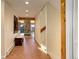 Brick floor entryway with built-in bench and stone fireplace at 25060 Montane Drive West, Golden, CO 80401