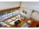 High-ceilinged living room with hardwood floors and mountain view at 25060 Montane Drive West, Golden, CO 80401