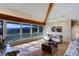 Living room boasts mountain views and hardwood floors at 25060 Montane Drive West, Golden, CO 80401