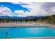 Community pool with mountain views at 25060 Montane Drive West, Golden, CO 80401