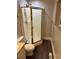 Cozy bathroom featuring a glass door shower and toilet, designed for functionality and comfort at 1222 Yosemite St, Denver, CO 80220