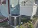 Residential AC unit placed adjacent to a fence in the backyard of the home at 1222 Yosemite St, Denver, CO 80220