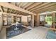 Spacious covered back deck is an extension of the home with outdoor dining area and gas grill at 6305 W 6Th Ave # C12, Lakewood, CO 80214