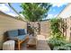 Secluded outdoor patio with a comfortable bench, perfect for relaxation and enjoying the outdoors at 6305 W 6Th Ave # C12, Lakewood, CO 80214