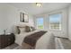 Cozy bedroom featuring natural light, neutral tones, and a comfortable bed at 12711 Colorado Blvd # 714G, Thornton, CO 80241