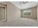 Bedroom showcasing a ceiling fan and a window bringing in light at 12711 Colorado Blvd # 714G, Thornton, CO 80241