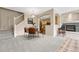 Cozy dining area with modern table set, open to kitchen and living room with fireplace at 12711 Colorado Blvd # 714G, Thornton, CO 80241