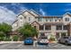 Attractive condominium building with stone accents, balconies, and well-designated parking spaces at 12711 Colorado Blvd # 714G, Thornton, CO 80241