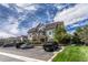 Beautiful condominium building featuring stone accents and well maintained landscaping at 12711 Colorado Blvd # 714G, Thornton, CO 80241