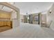 Open-concept living area featuring a ceiling fan and access to the kitchen at 12711 Colorado Blvd # 714G, Thornton, CO 80241