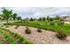 View of a well maintained neighborhood featuring manicured lawns and green spaces at 7991 Heritage Dr, Thornton, CO 80602