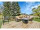 Relax on this deck offering scenic views of lush greenery and distant mountains at 1 Red Fox Ln, Littleton, CO 80127