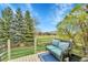 Relax on this deck offering scenic views of lush greenery and distant mountains at 1 Red Fox Ln, Littleton, CO 80127
