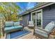Cozy deck area with comfortable seating, perfect for outdoor relaxation and entertaining at 1 Red Fox Ln, Littleton, CO 80127
