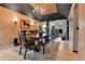 A dining room shows hardwood floors and ornate ceilings at 1 Red Fox Ln, Littleton, CO 80127