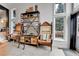 Unique sitting room with creative storage and large windows providing natural light at 1 Red Fox Ln, Littleton, CO 80127