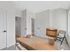 Bright office space featuring a light wood desk, neutral colors, and easy access to storage at 8028 W 52Nd Ln # B, Arvada, CO 80002
